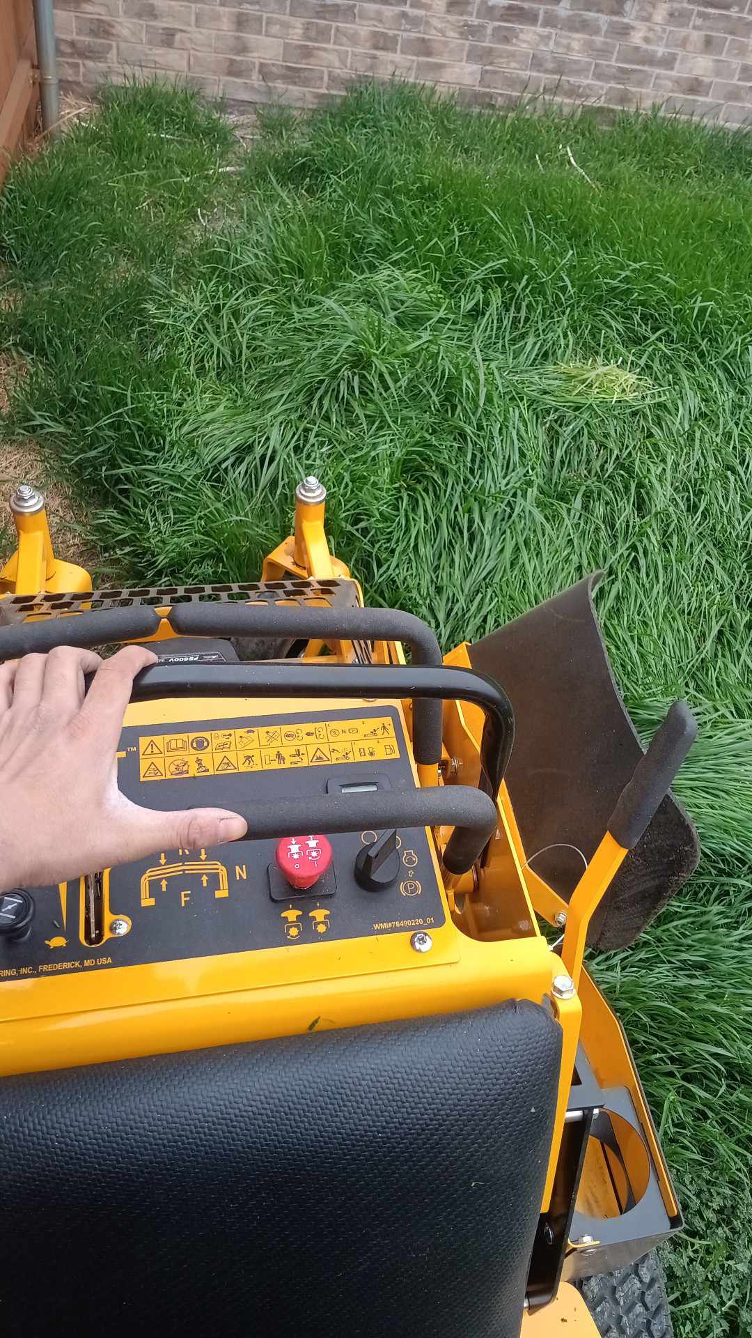 Mowing through an overgrown Lubbock yard